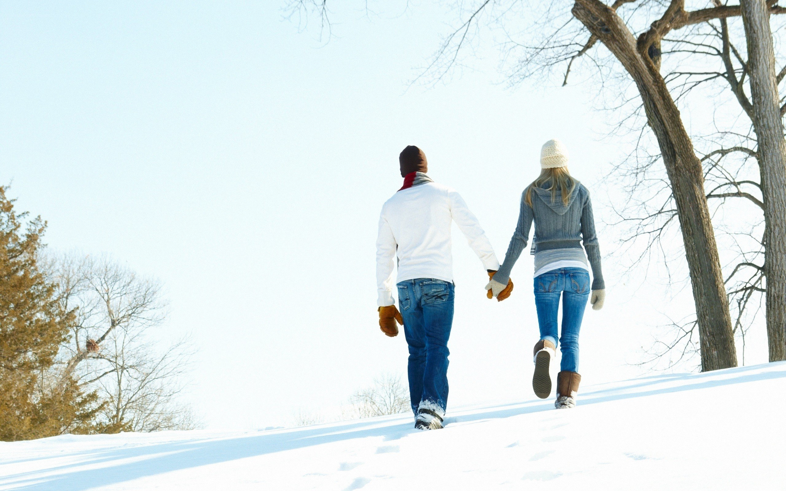 Couple walking in snow