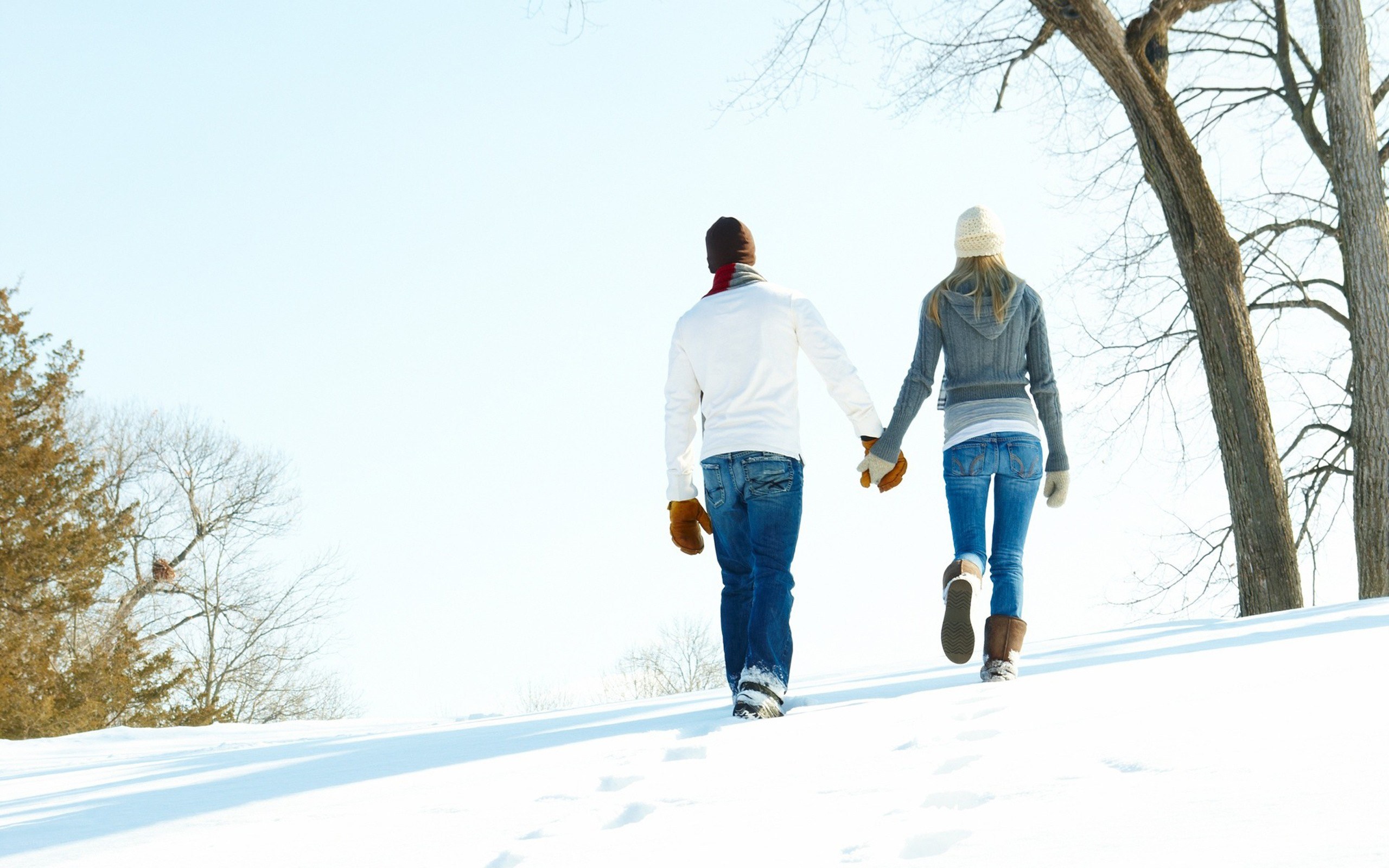 Couple walking in snow