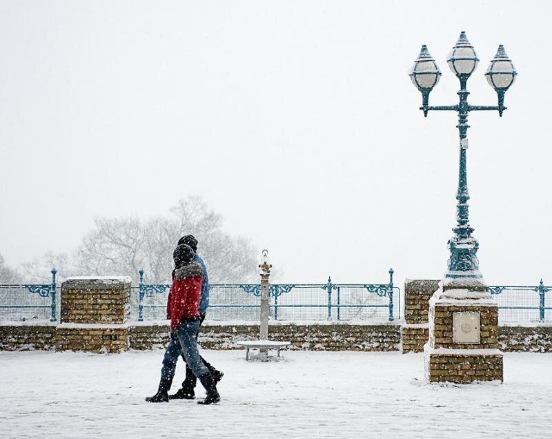 Couple walking in snow