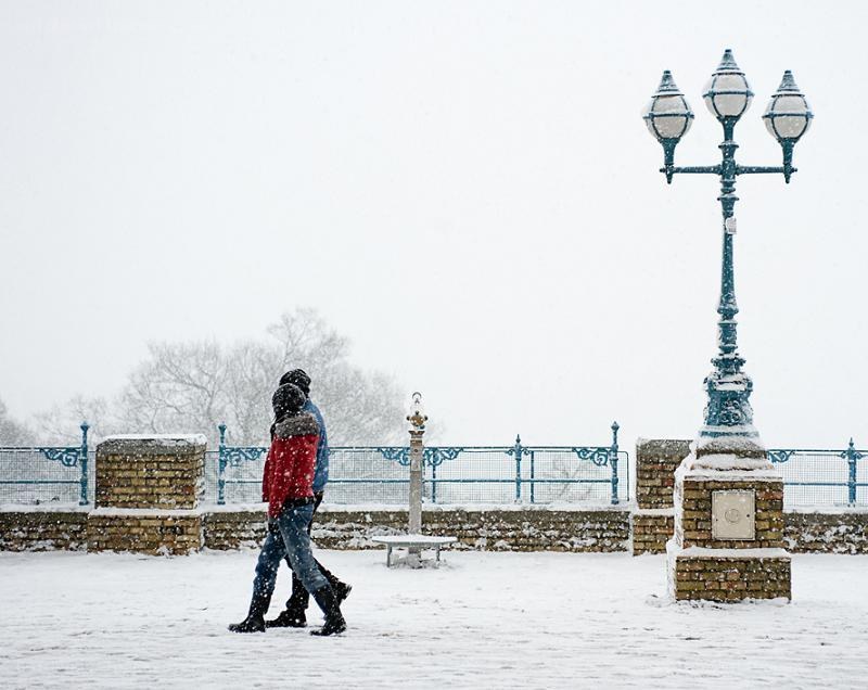Couple walking in snow