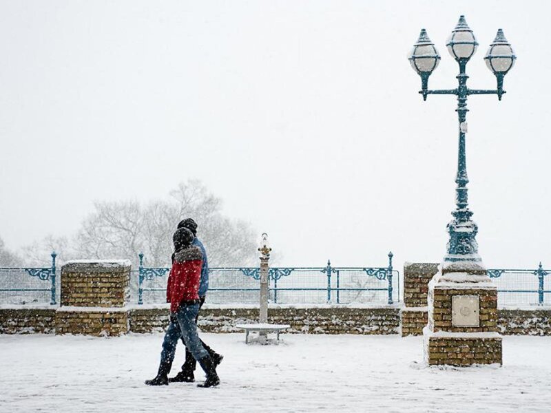 Couple Walking in Snow — White, Cold, Winter