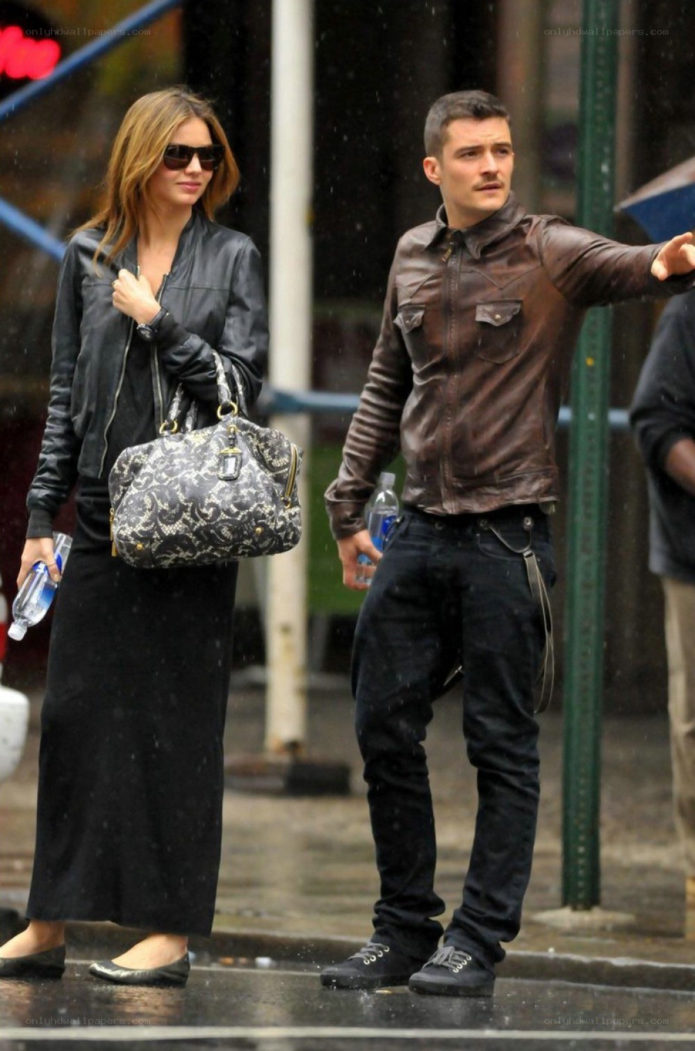 couple walking in the rain