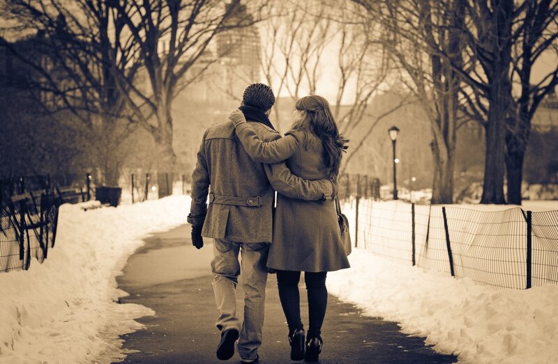 Couple walking in winter park