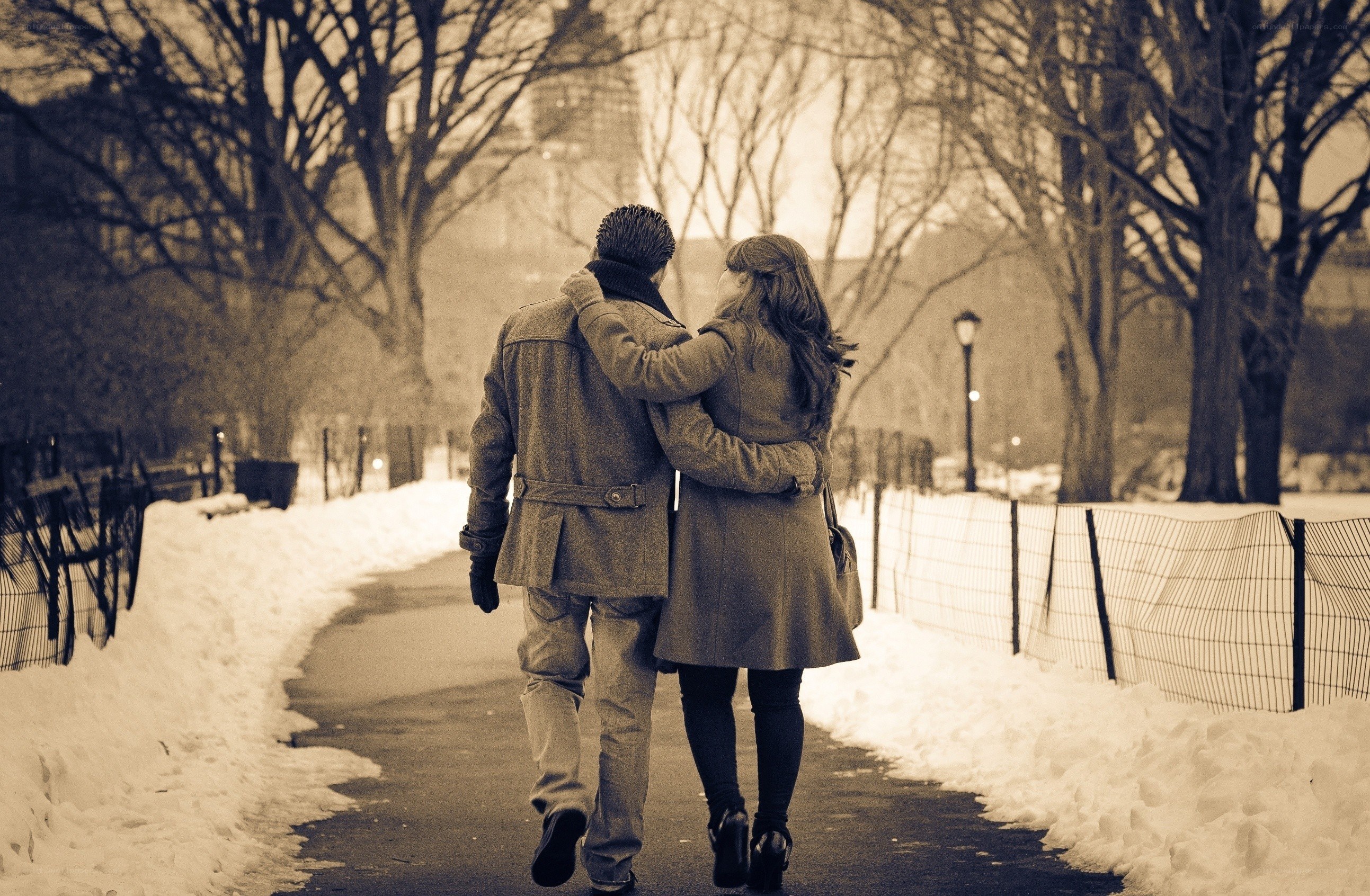 Couple walking in winter park