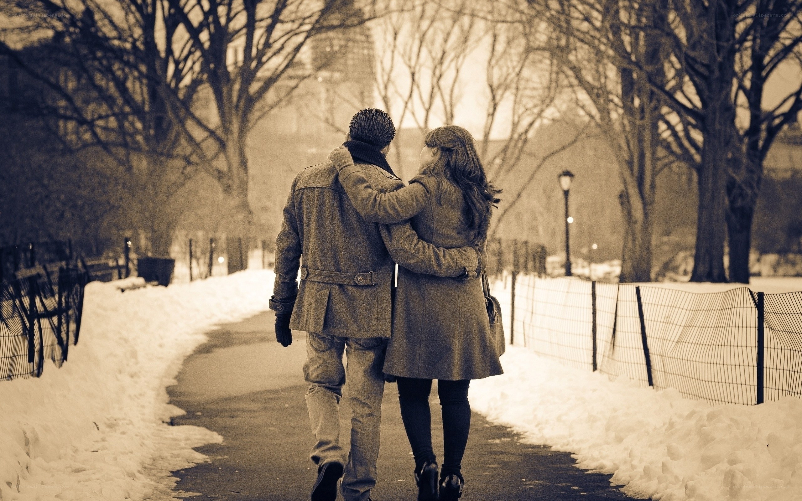Couple walking in winter park