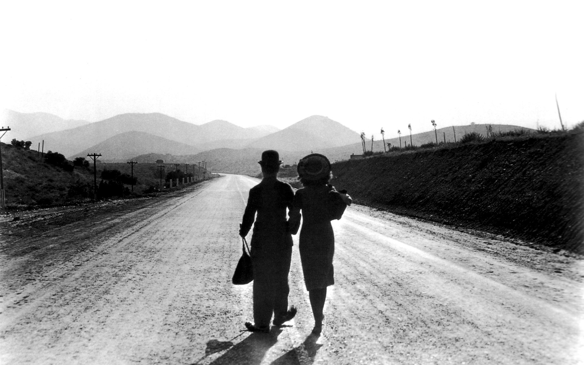 Couple walking on a road