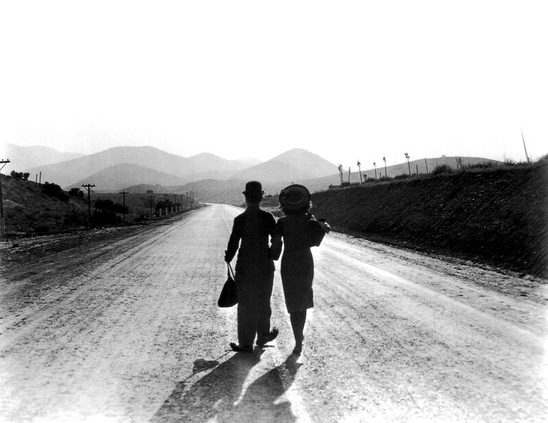 Couple walking on a road