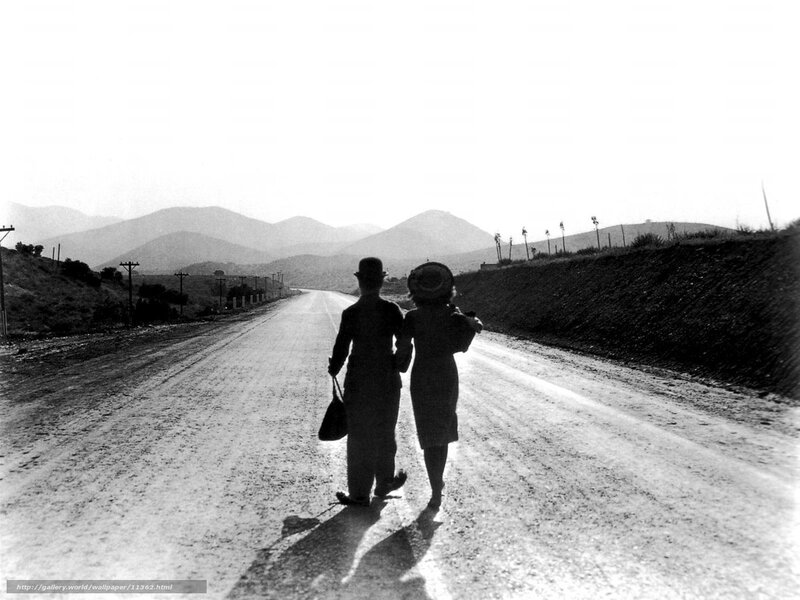 Couple walking on a road