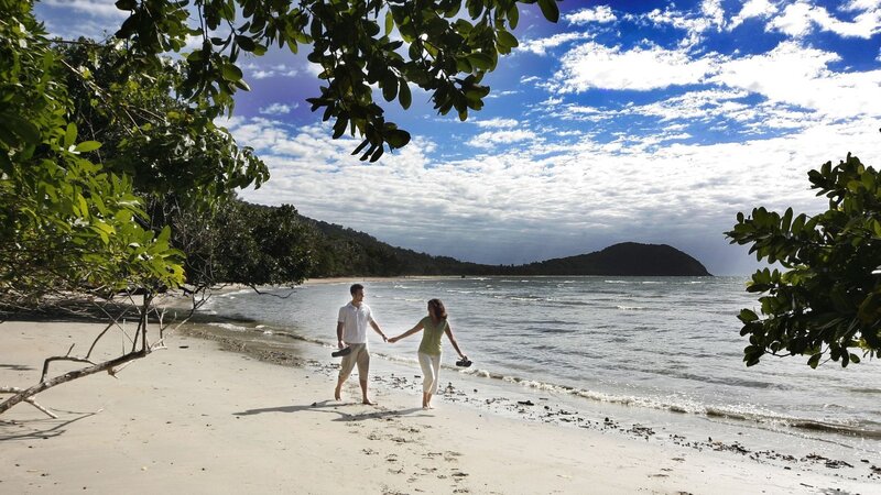 Couple walking on beach