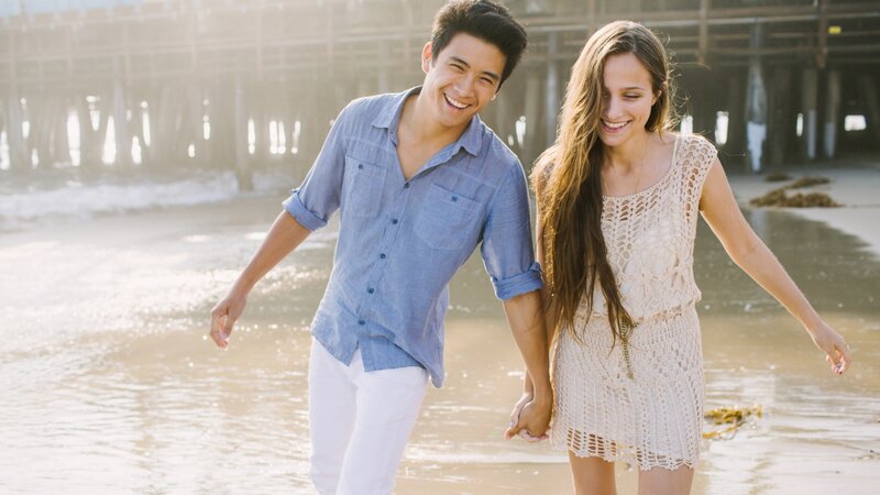 Couple walking on the beach