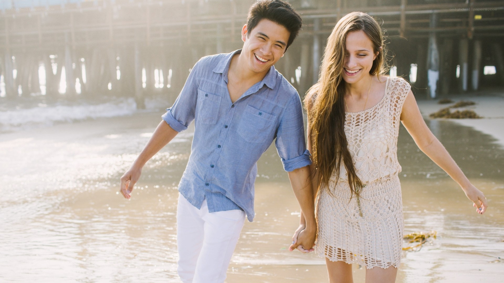 Couple walking on the beach