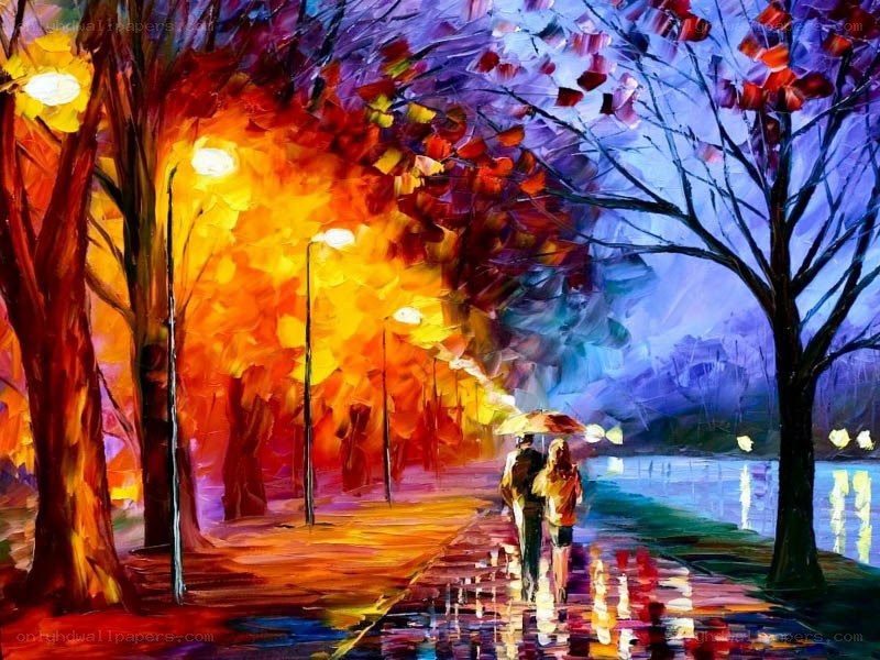 Couple walking under autumn trees