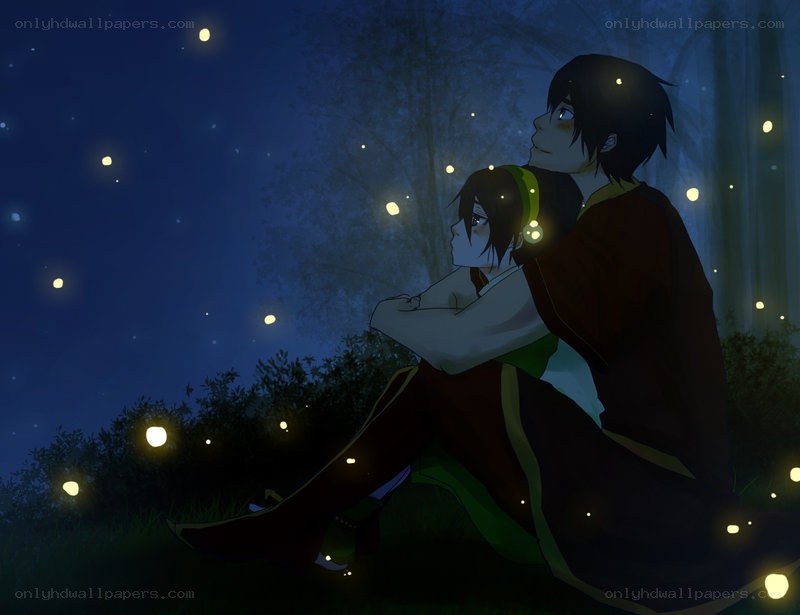 couple watching fireflies at night