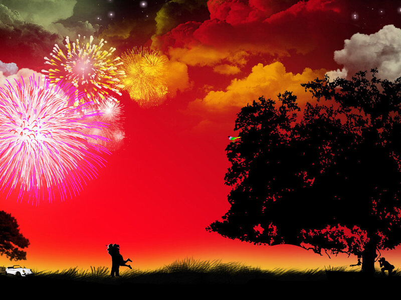 Couple watching fireworks at night