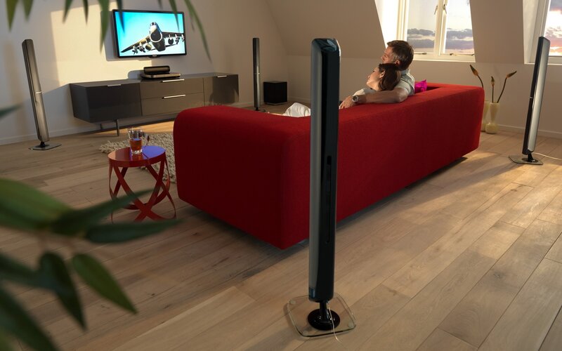 Couple watching TV in living room