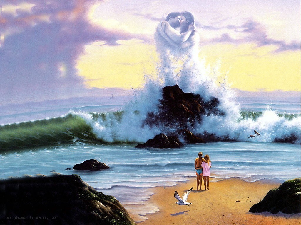 Couple watching waves at sunset