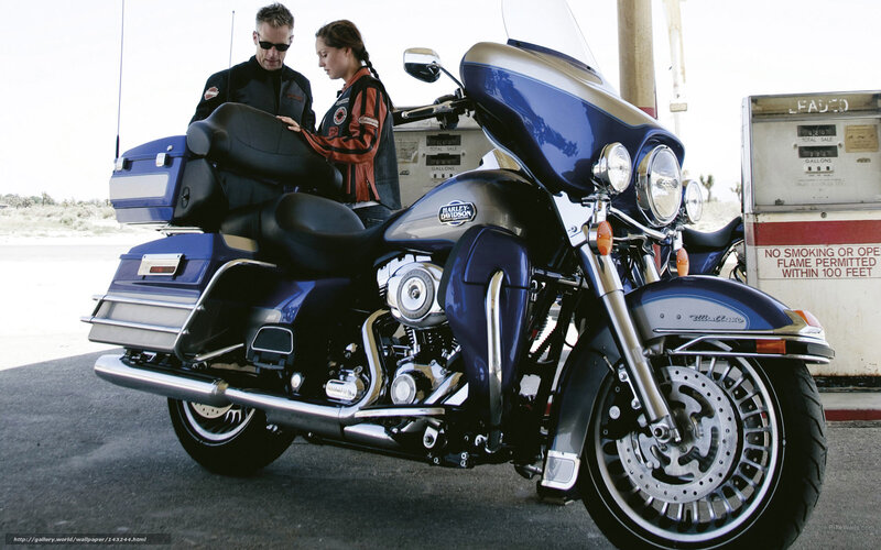 Couple with blue motorcycle