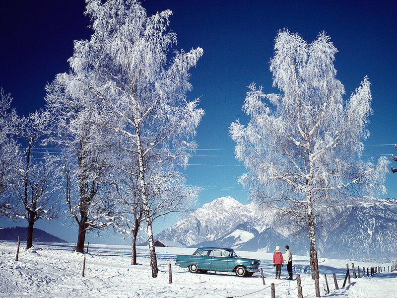 Couple with Car in Snow