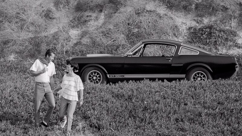 Couple with classic car