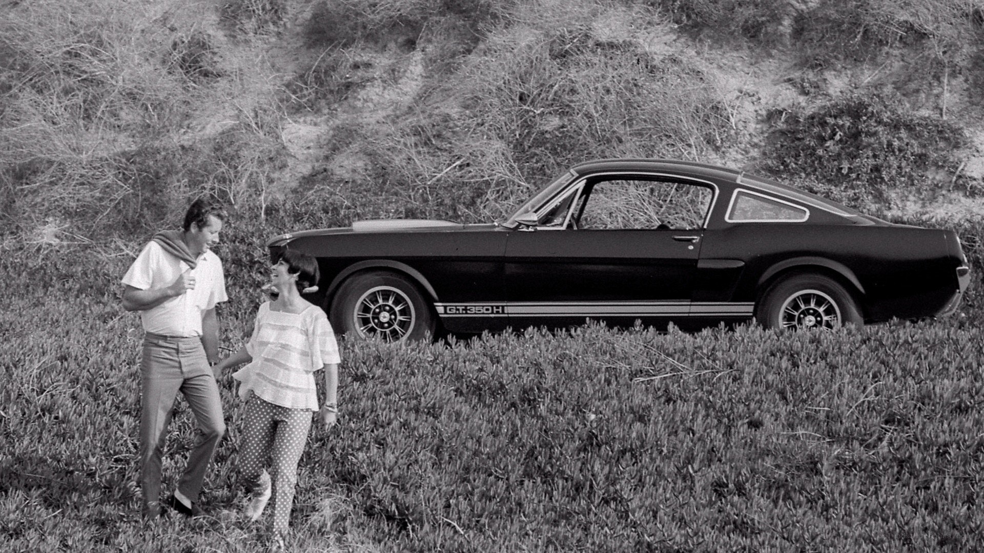 Couple with classic car