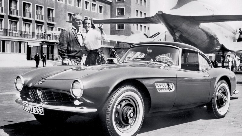 Couple with classic car