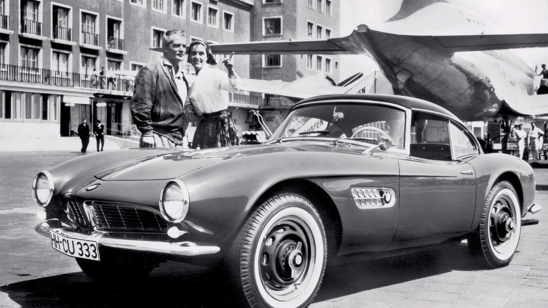 Couple with classic car