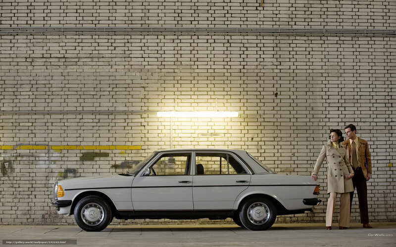 Couple with classic car