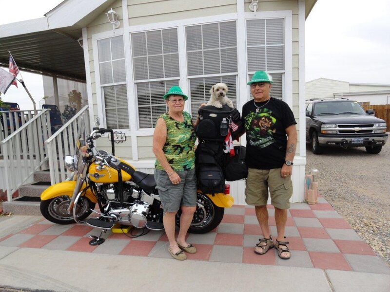 Couple with Dog and Motorcycle