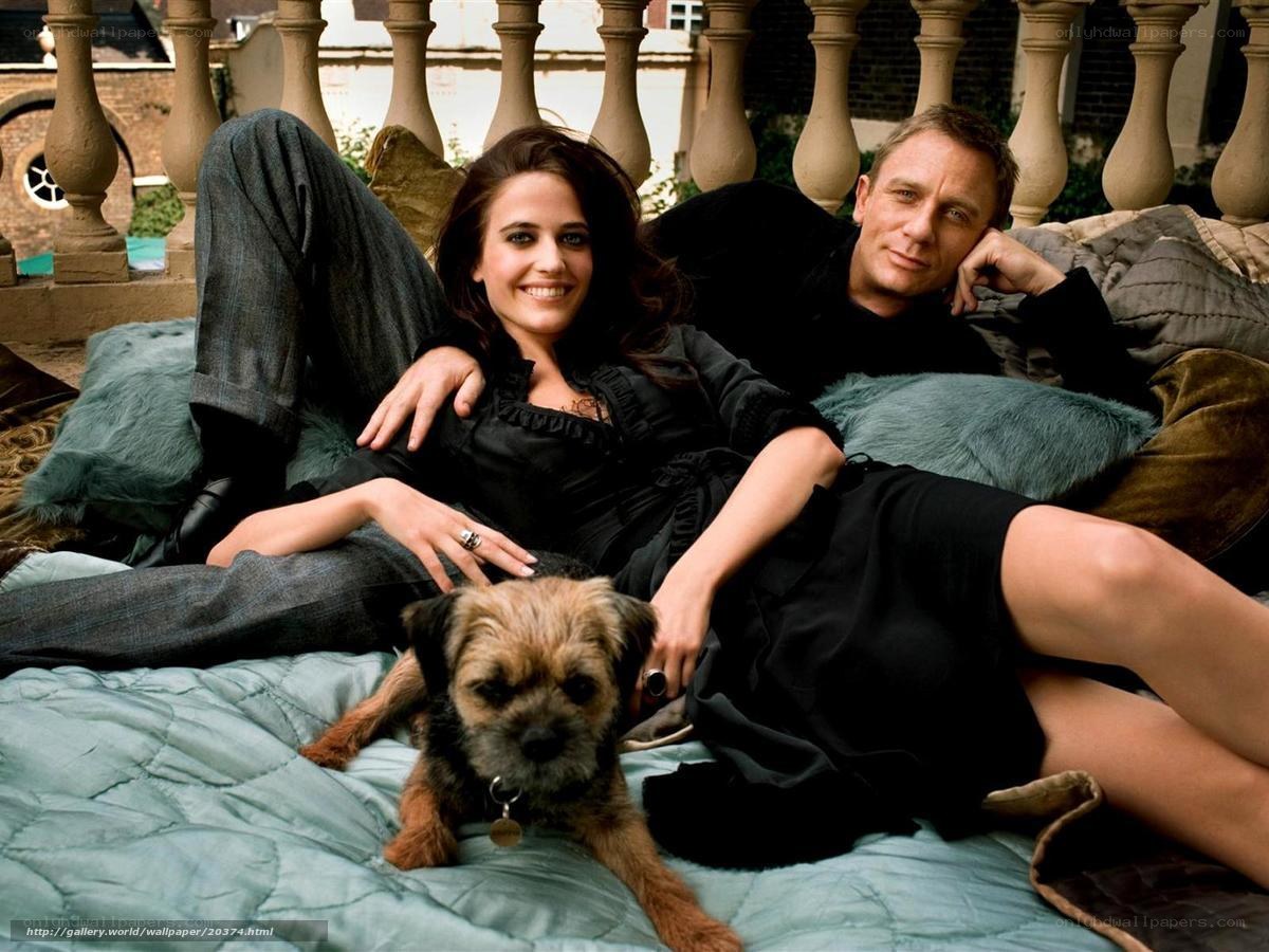 Couple with dog on balcony