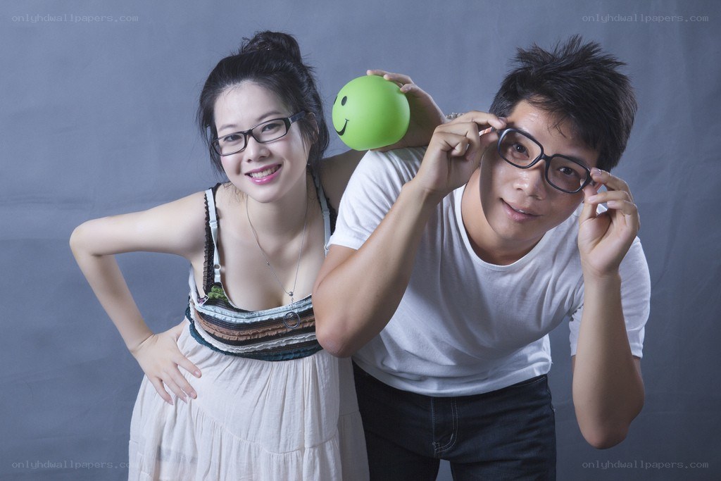 Couple with green ball