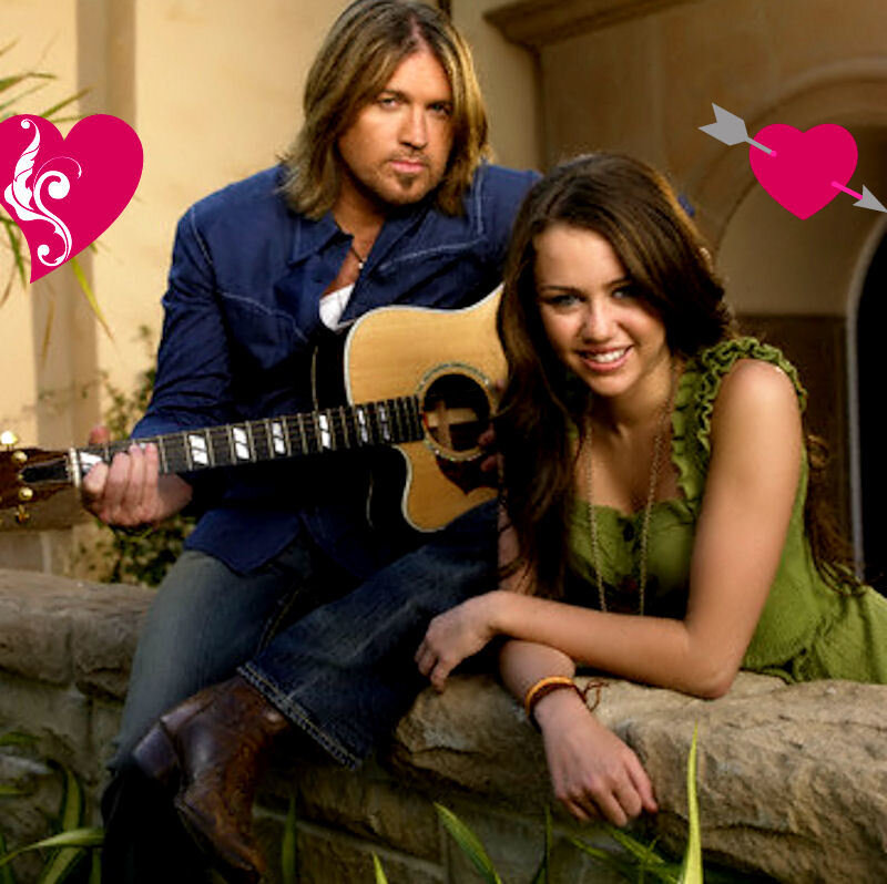 Couple with guitar on stone wall