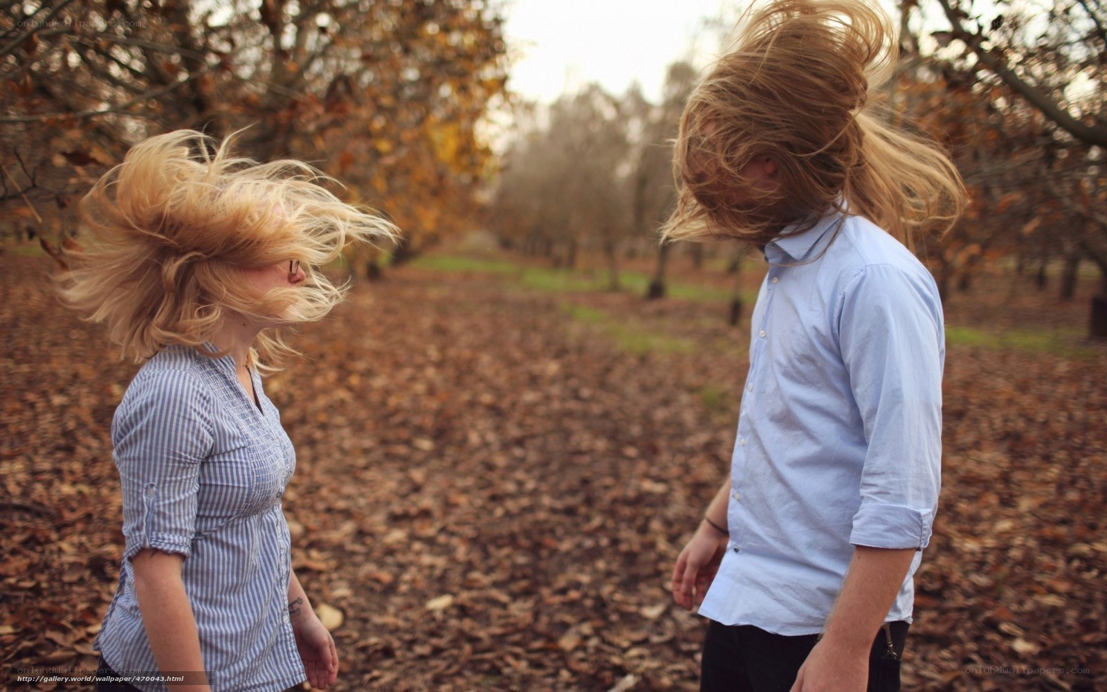 Couple with hair blowing in wind