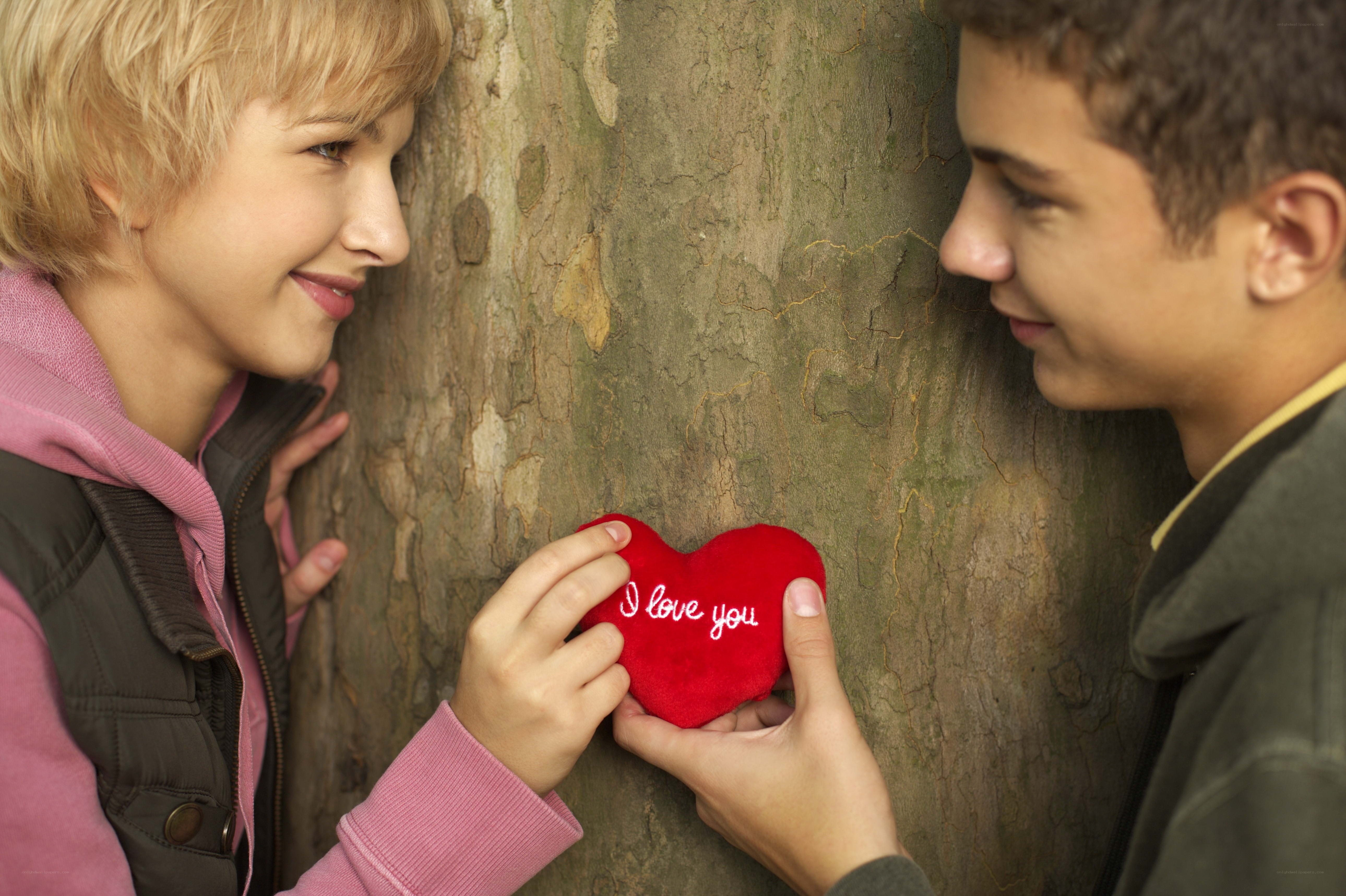 Couple with heart pillow