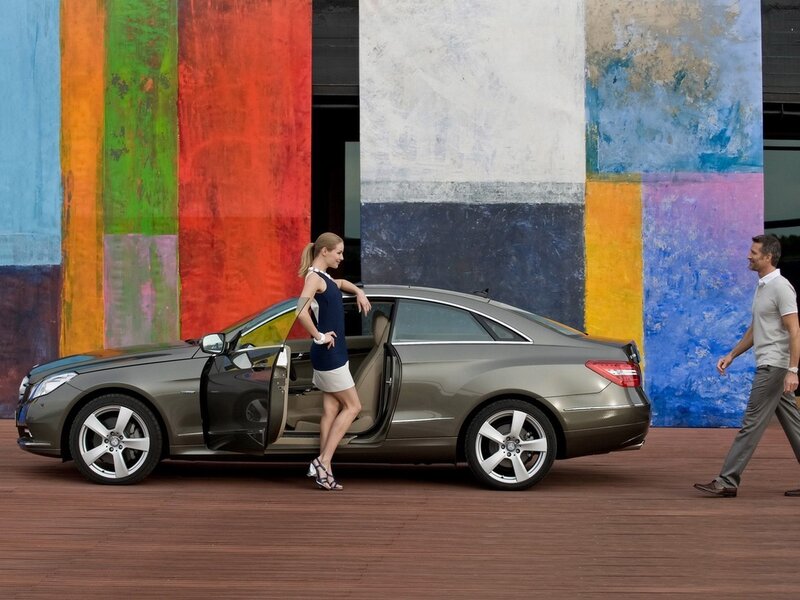 Couple with luxury car