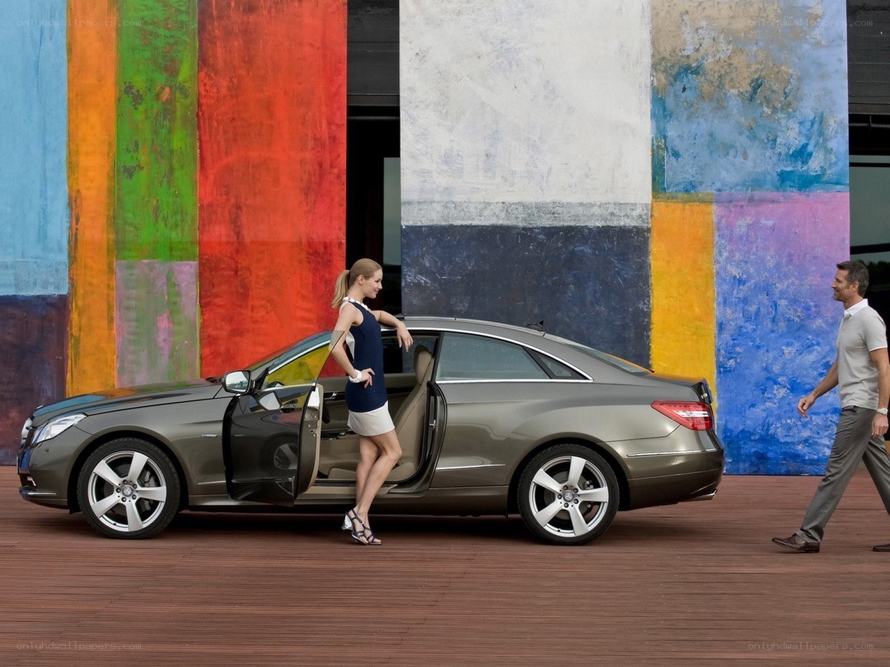 Couple with luxury car
