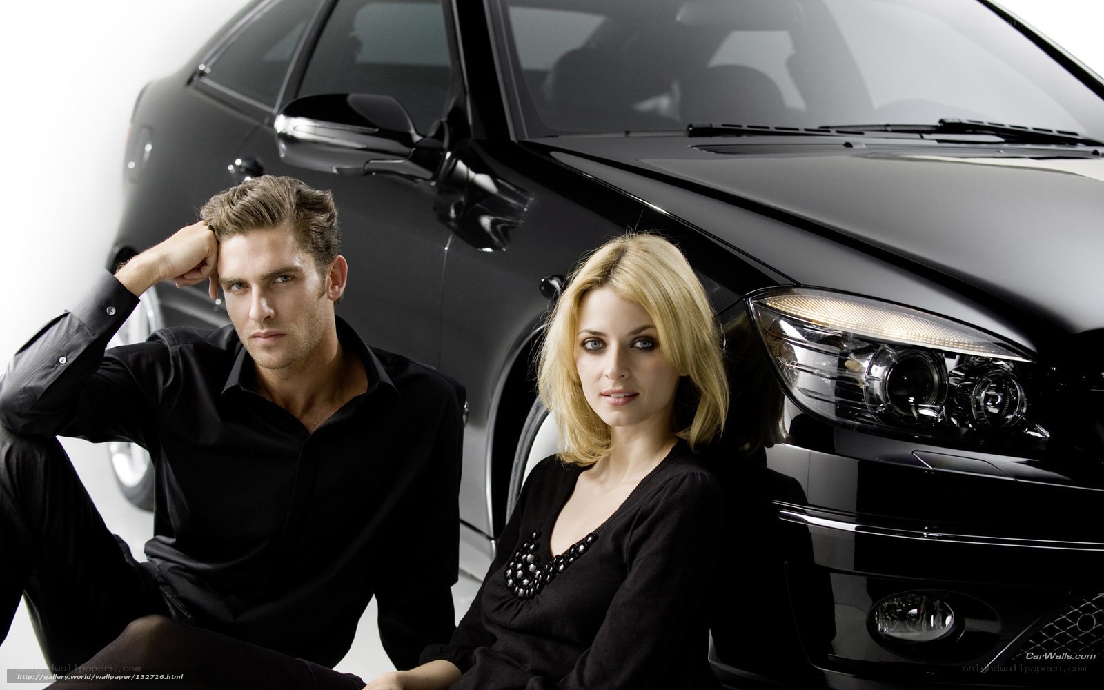 Couple with luxury car