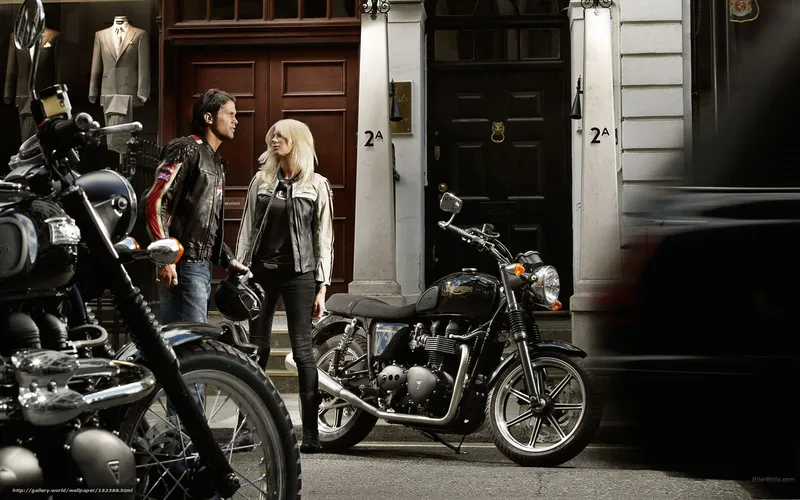 Couple with motorcycles on street
