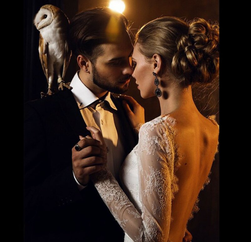 Couple with Owl on Shoulder