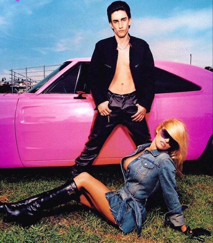 Couple with pink car