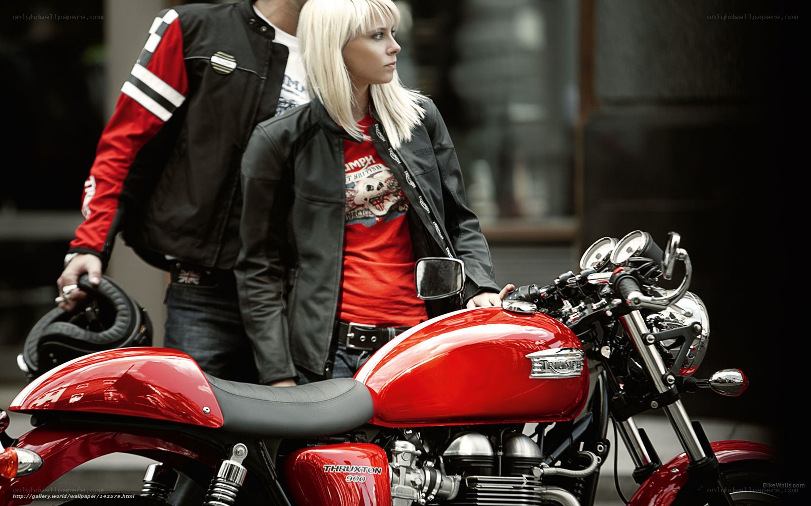 Couple with red motorcycle
