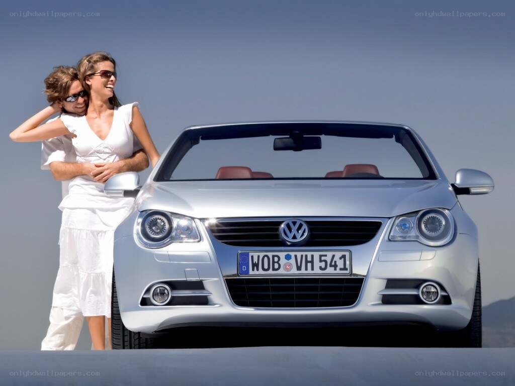 Couple with silver convertible