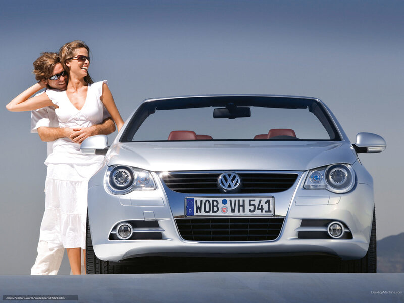 Couple with silver convertible