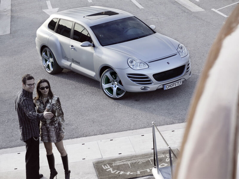 Couple with silver SUV