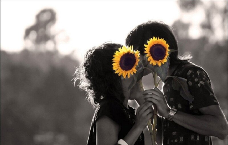 Couple with sunflowers