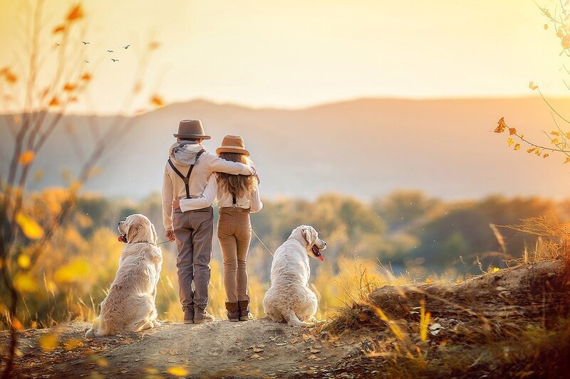 Couple with Two Dogs