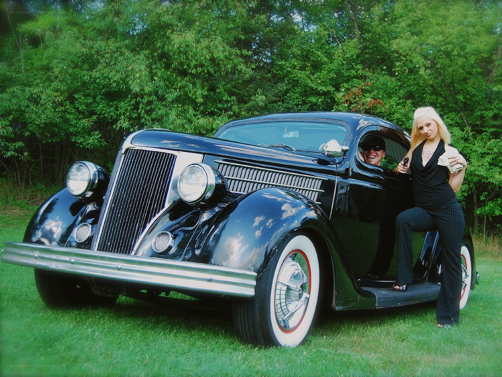Couple with vintage car