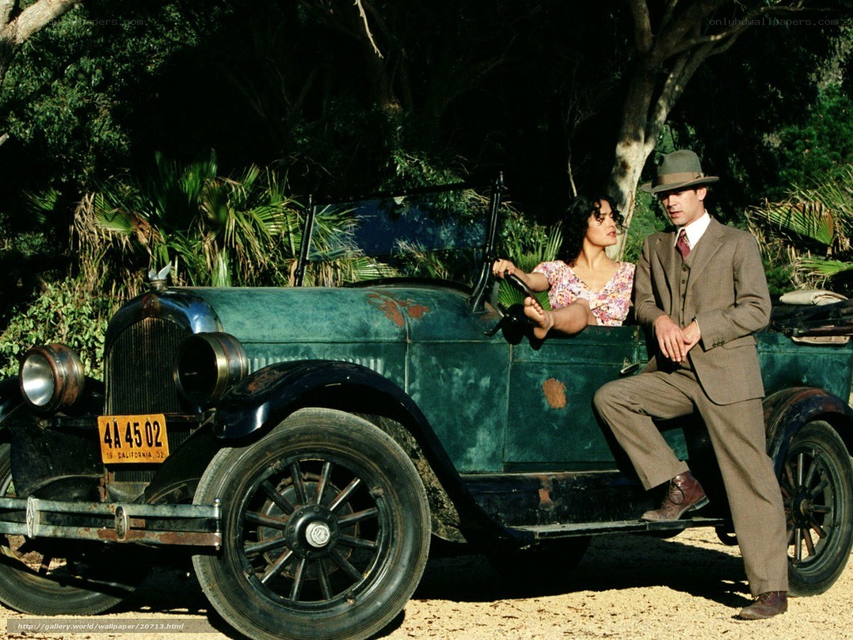 Couple with vintage car