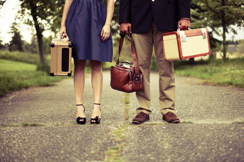 couple with vintage luggage