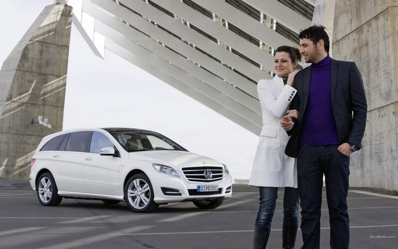 Couple with white Mercedes-Benz