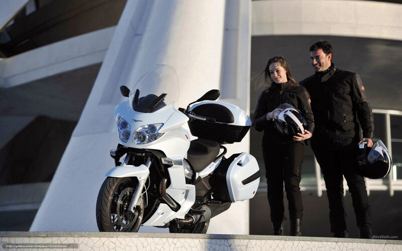 Couple with white motorcycle